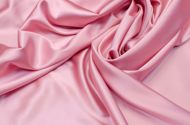 Premium Photo  Silk fabric, light pink satin fabric