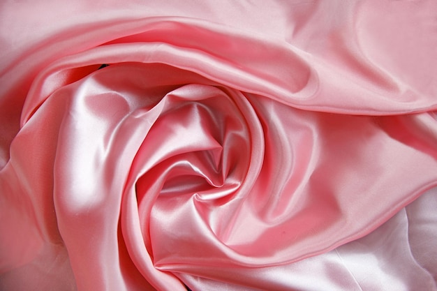 Silk is beautifully draped in pink top view