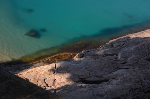 Silky emerald waters & rocky coast