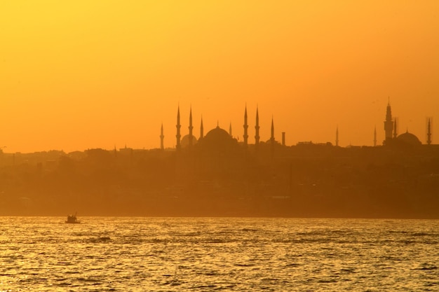 Sillhouette of istanbul at sunset ramadan time with the muslim city istanbul silhouette