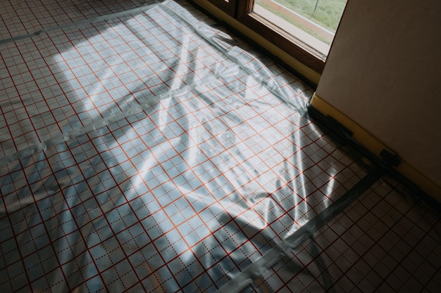 Silver aluminium foil prepared for underfloor heating