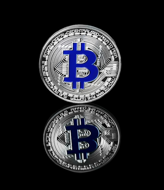 Silver bitcoin on black