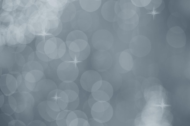 Silver bokeh abstract texture Gray defocused background with bl