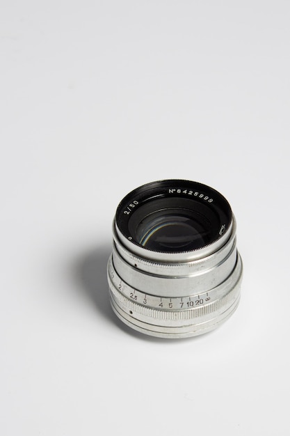 A silver camera lens with the number 1 on it