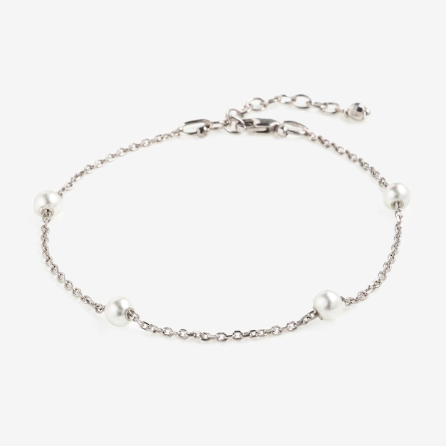 Silver chainbracelet with pendent and pearls isolated on white background