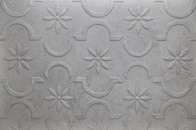 Silver concrete background with patterns. Space for text