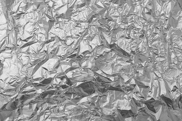 Silver crumpled foil background