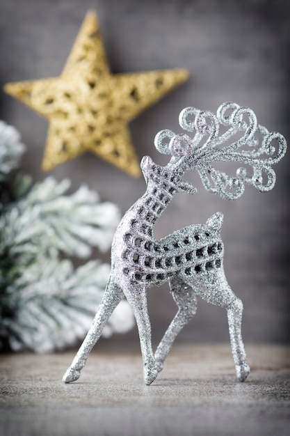 Silver deer on gray background