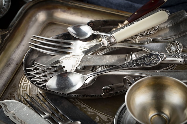 Silver dishes on old surface