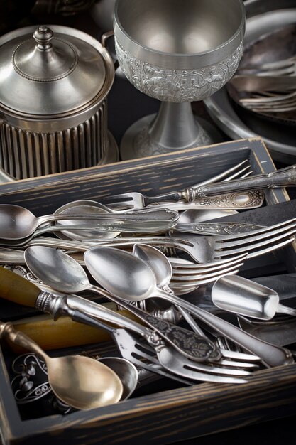 Silver dishes on old surface