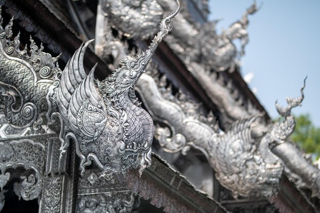 The silver dragon on the roof of the temple