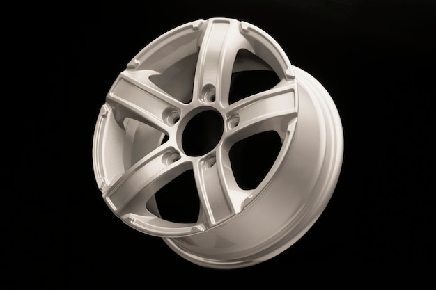 Silver five-spoke alloy wheels rim for a crossover or SUV on black