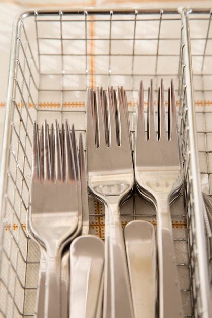 Silver Forks on Table Backdrop