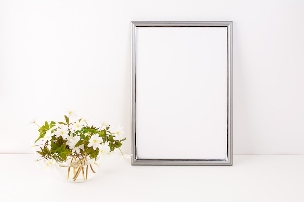 Silver frame with Rue Anemone flowers