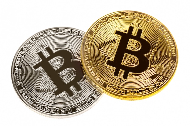 Silver and gold bitcoin coins isolated on white