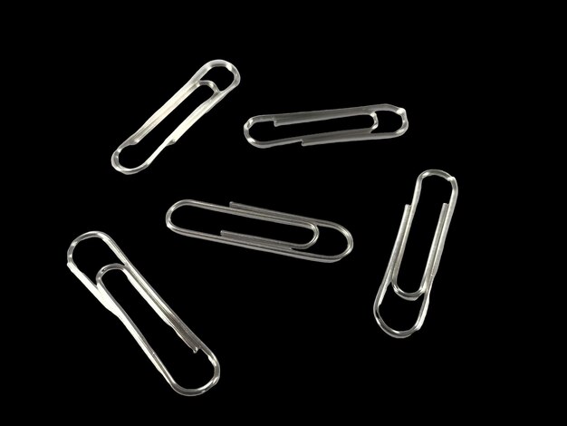 Photo a silver paper clip