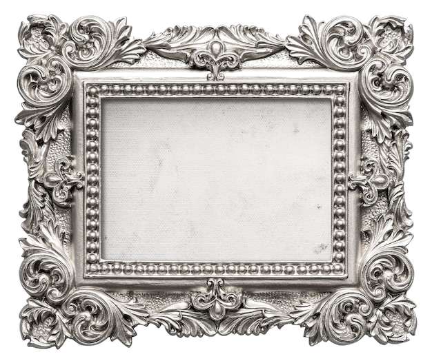 Photo silver picture frame with grungy canvas. vintage baroque art object isolated on white background