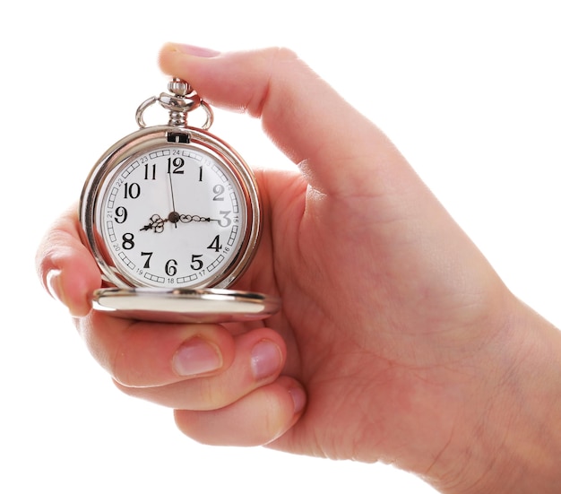 Silver pocket clock in hand isolated on white