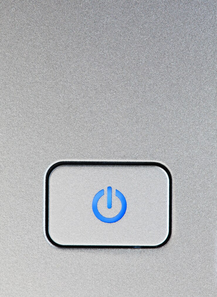 Photo シルバーの電源ボタンのクローズアップ