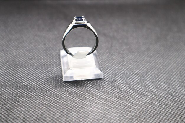 silver ring with a black stone