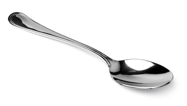 Silver spoon isolated on white background close up