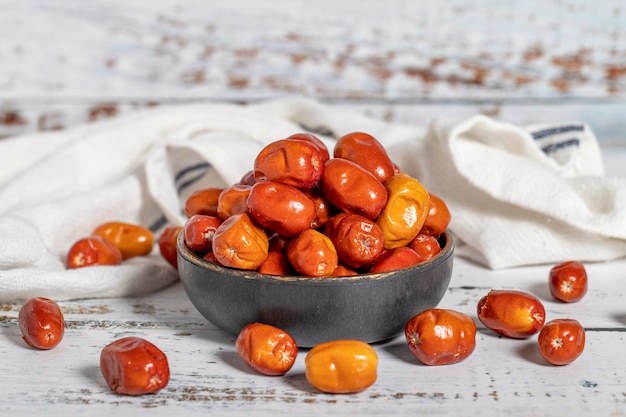 Photo silverberry on wood background healthy food close up