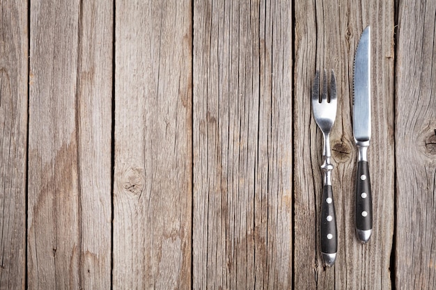 Silverware on wooden table