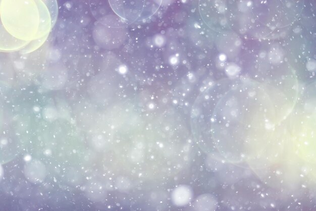 Silvery blue highlights snow rain water blurred background