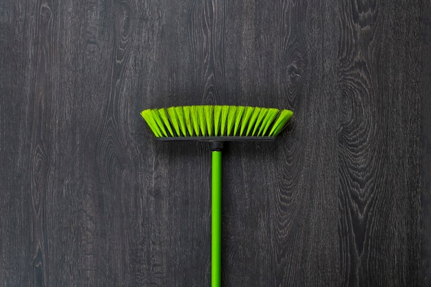 A simple cleaning colorful brush flat lay on the floor isolated