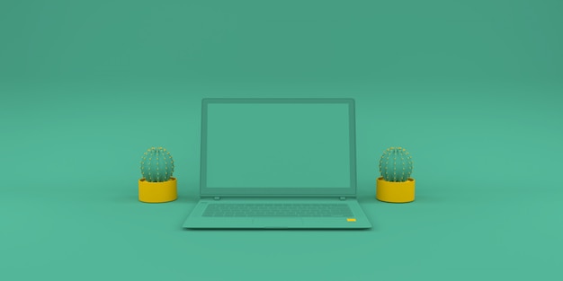 Simple  composition with laptop on green background