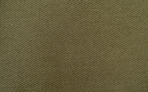 simple green woven texture may used as background, diagonal lines linen cotton fabric