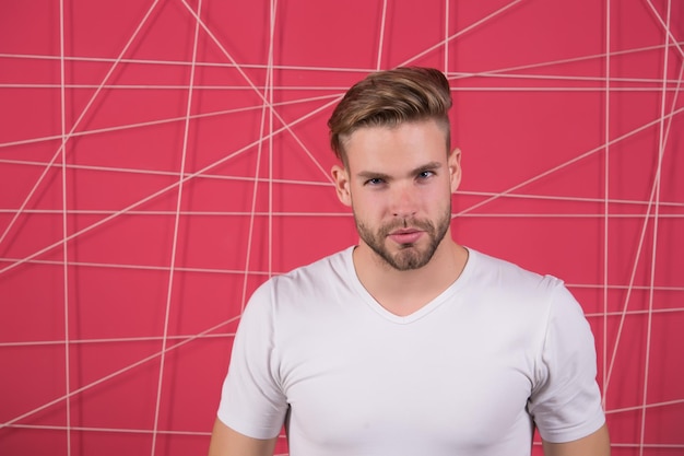 Simple hacks to make hairstyle better Use right product styling hair Confident with tidy hairstyle Barber hairstyle tips Man bearded guy modern hairstyle in pensive mood pink background