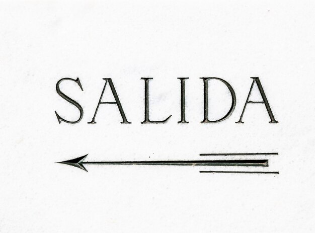 Simple marble cartel with the word salida (exit in spanish)