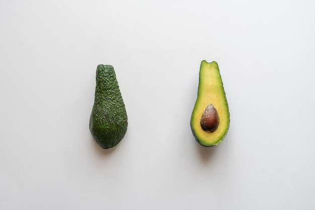 A simple minimalistic slice of fresh avocado eco organic product