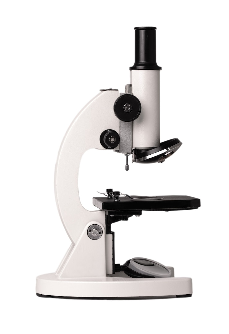Photo simple new school microscope carved on a white background