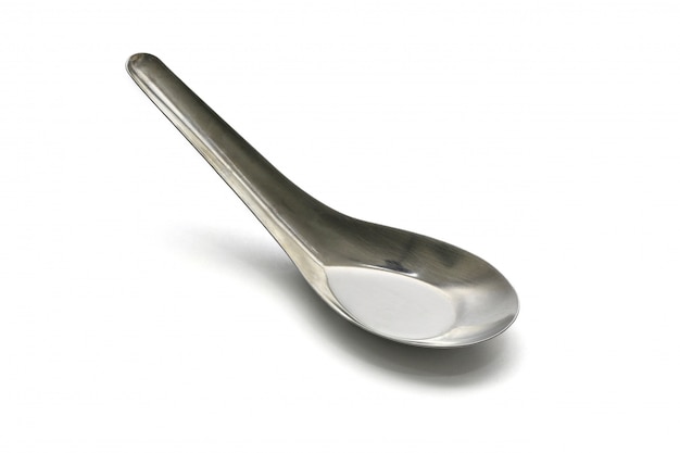 Simple normal spoon isolated on white surface