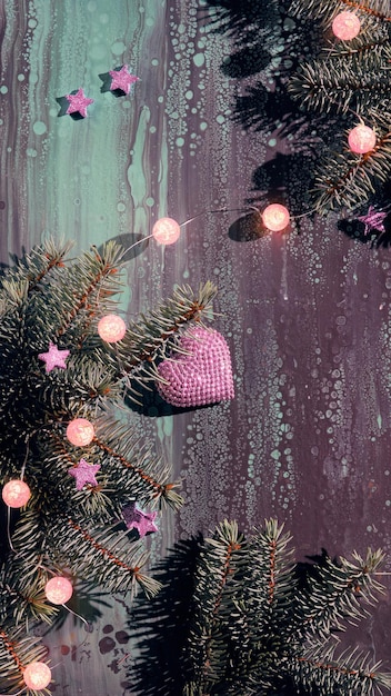 Simple pink christmas decorations on dark abstract background xmas lights ball garland pink stars