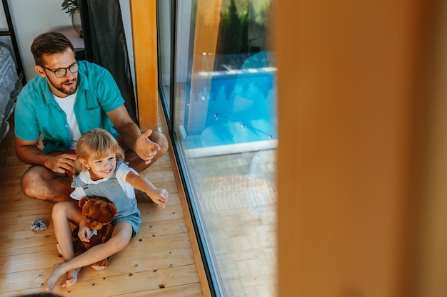 Simple pleasures at home with his daughter