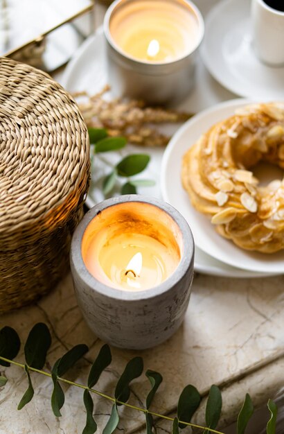 Simple real breakfast with coffee and custard cake on white plate