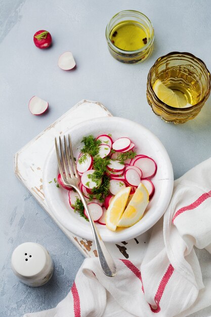 Simple salad of fresh radish with dill