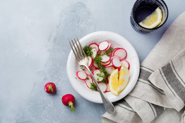 Simple salad of fresh radish with dill