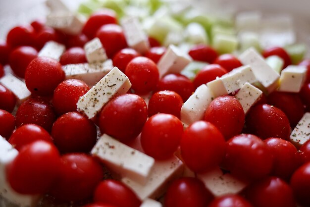 A simple salad for a healthy diet cherry tomatoes celery and slices of cheese