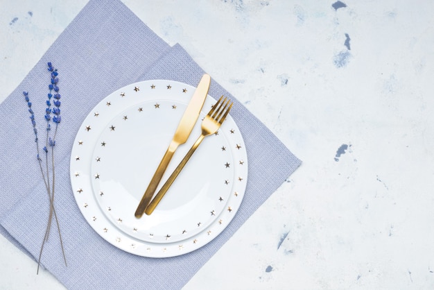 Simple table setting on white