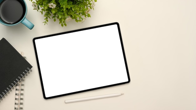 Premium Photo | Simple white workspace background with digital tablet  touchpad white screen mockup and accessories