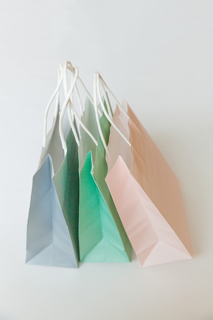 Simply minimal design three many shopping bag isolated on white background