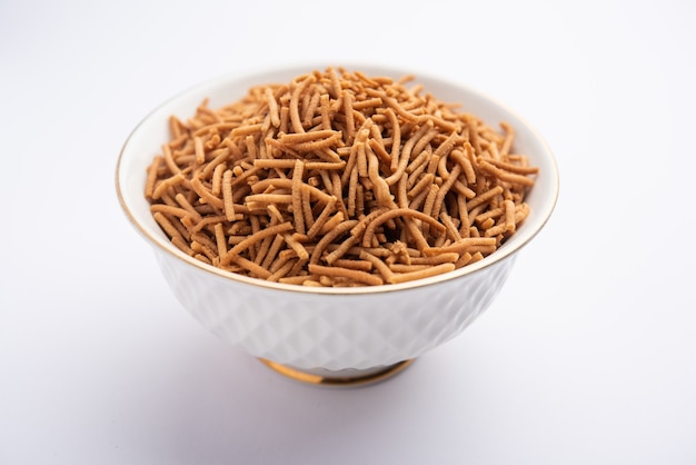 Singada or singhara garlic sev, Namkeen shev a vrat food made using water chestnut served in a bowl