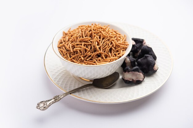 Singada or singhara garlic sev, Namkeen shev a vrat food made using water chestnut served in a bowl