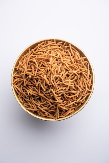 Singada or singhara garlic sev, Namkeen shev a vrat food made using water chestnut served in a bowl