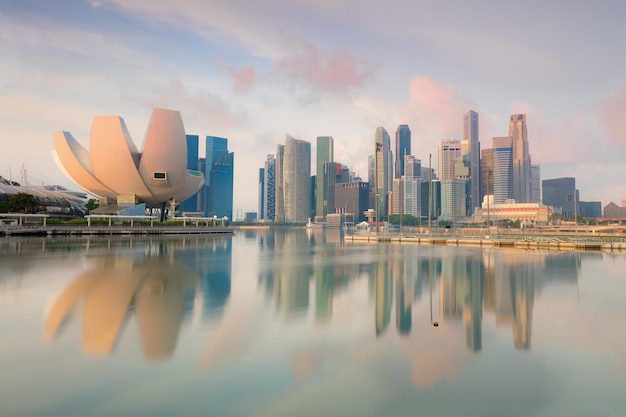 Singapore cityscape at early morning on sea water Landscape of Singapore business building