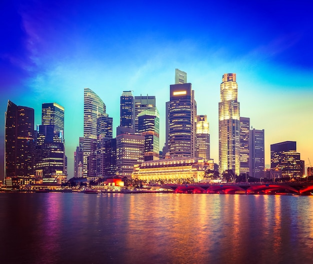 Singapore skyline and river in evening